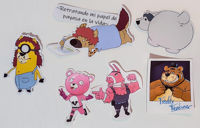 A bunch of furry themed stickers